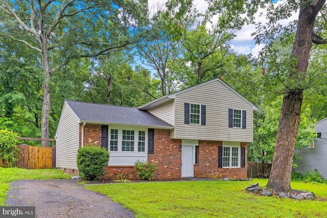 6908 Wild Turkey Dr, Spotsylvania, VA 22553 - split level home featuring brick siding and a shingled roof