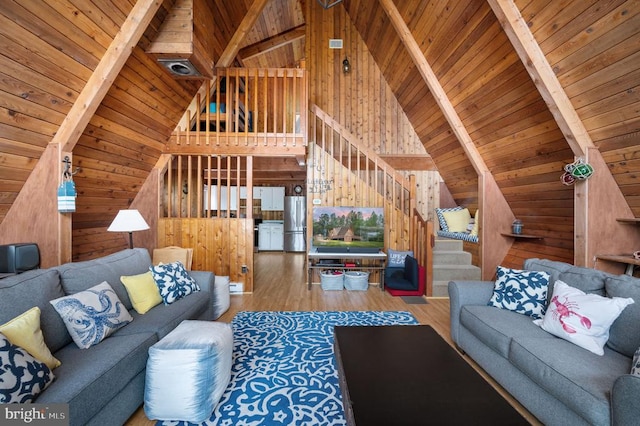 3477 Elk Creek Rd, Mineral, VA 23117 - living room with wooden ceiling, wood walls, and wood finished floors