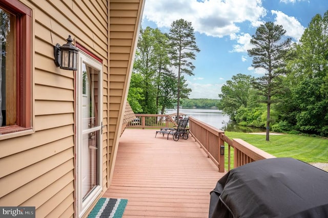 3477 Elk Creek Rd, Mineral, VA 23117 - wooden deck featuring a water view, a lawn, and a grill