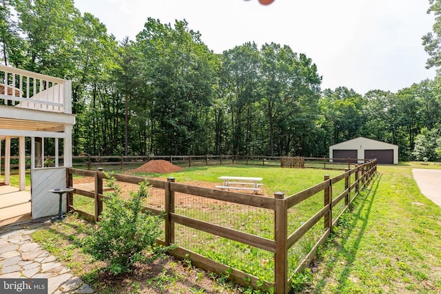 11428 Orange Plank Rd, Locust Grove, VA 22508 - view of yard featuring a garage and an outbuilding