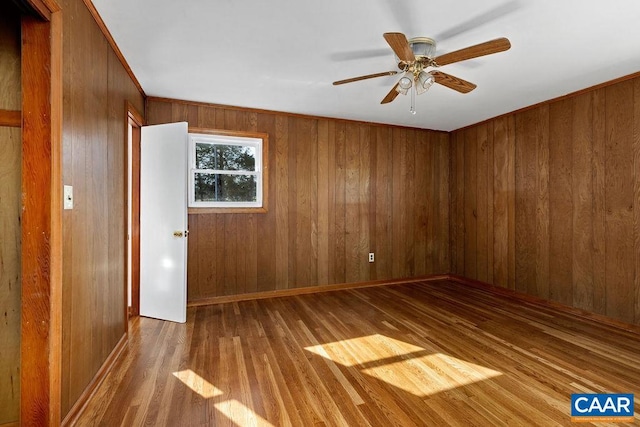 492 Avon Rd, Afton, VA 22920 - unfurnished room featuring ceiling fan, wood walls, and wood finished floors
