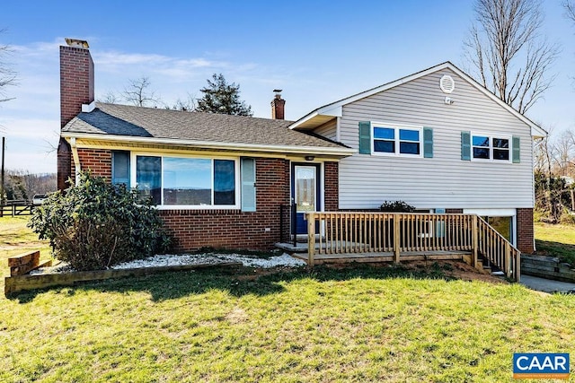 492 Avon Rd, Afton, VA 22920 - tri-level home featuring a deck, a chimney, brick siding, and a front yard