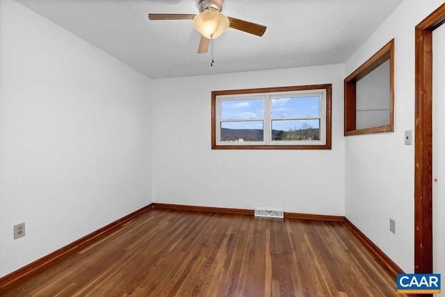 492 Avon Rd, Afton, VA 22920 - spare room with visible vents, baseboards, ceiling fan, and dark wood-style floors