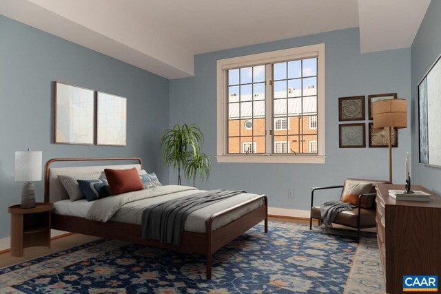 bedroom featuring baseboards