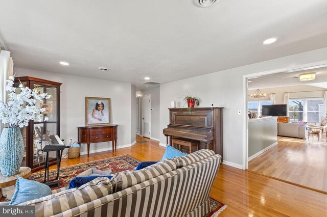 2266 Honeyville Rd, Stanley, VA 22851 - living room featuring wood finished floors, baseboards, and recessed lighting