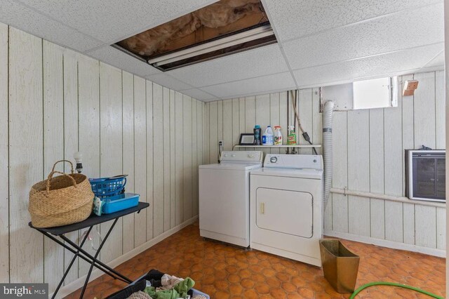 2266 Honeyville Rd, Stanley, VA 22851 - laundry room featuring washing machine and dryer, wood walls, and baseboards