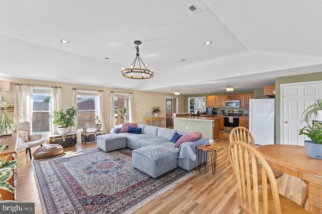 2266 Honeyville Rd, Stanley, VA 22851 - living area with light wood-style floors, a chandelier, and recessed lighting