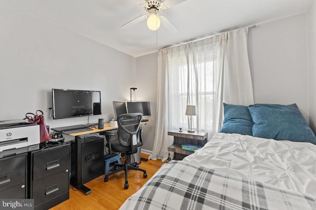 2266 Honeyville Rd, Stanley, VA 22851 - bedroom with light wood finished floors, an office area, and ceiling fan