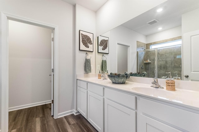 6 Windsong Ct N, Fishersville, VA 22939 - full bath featuring wood finished floors, a shower stall, double vanity, and baseboards