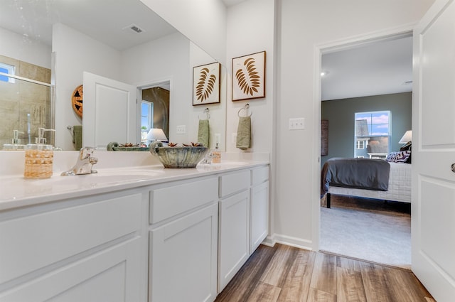 6 Windsong Ct N, Fishersville, VA 22939 - bathroom with ensuite bath, wood finished floors, a stall shower, and double vanity