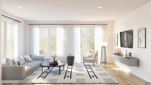 1 Swallowtail St, Charlottesville, VA 22902 - living room with recessed lighting, baseboards, a healthy amount of sunlight, and wood finished floors