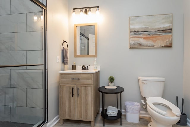 442 First St, Shenandoah, VA 22849 - full bath with a shower stall, toilet, vanity, baseboards, and wood finished floors