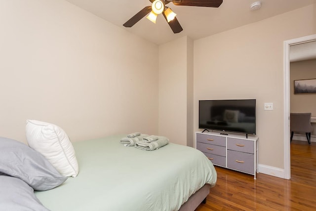 442 First St, Shenandoah, VA 22849 - bedroom with wood finished floors, a ceiling fan, and baseboards