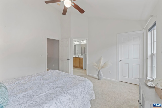 921 Bing Ln, Charlottesville, VA 22903 - bedroom with light colored carpet, ceiling fan, ensuite bathroom, and high vaulted ceiling