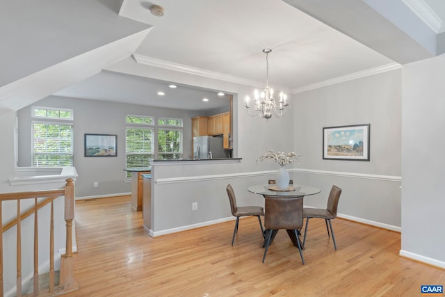 921 Bing Ln, Charlottesville, VA 22903 - dining room with crown molding, light wood finished floors, a chandelier, and recessed lighting