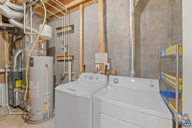 921 Bing Ln, Charlottesville, VA 22903 - laundry area with gas water heater and washer and dryer