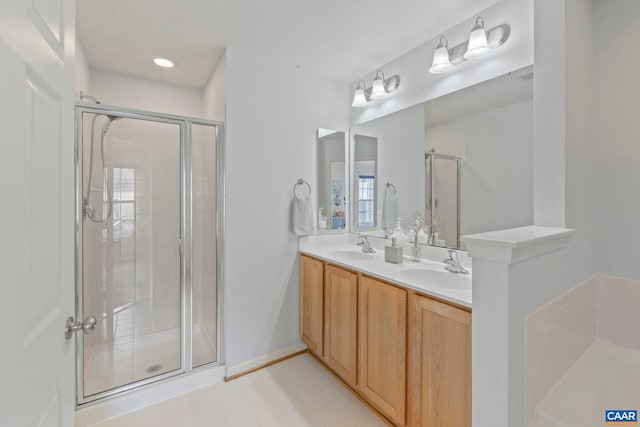 921 Bing Ln, Charlottesville, VA 22903 - full bath featuring a stall shower, double vanity, and a bath