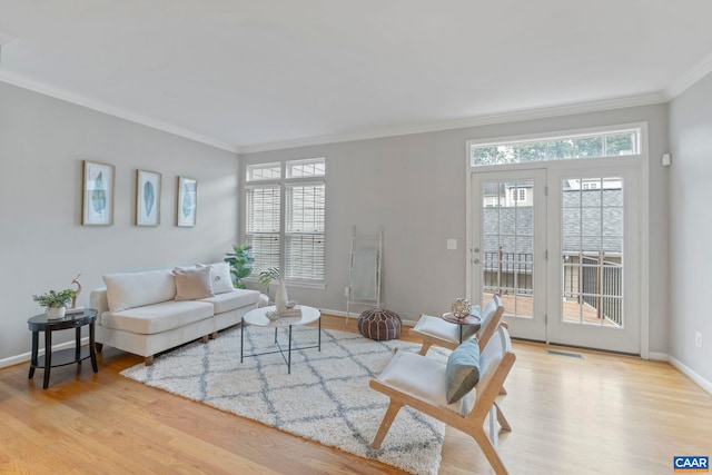 921 Bing Ln, Charlottesville, VA 22903 - living room featuring ornamental molding and wood finished floors
