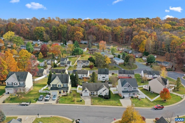 aerial view with a view of trees and a residential view