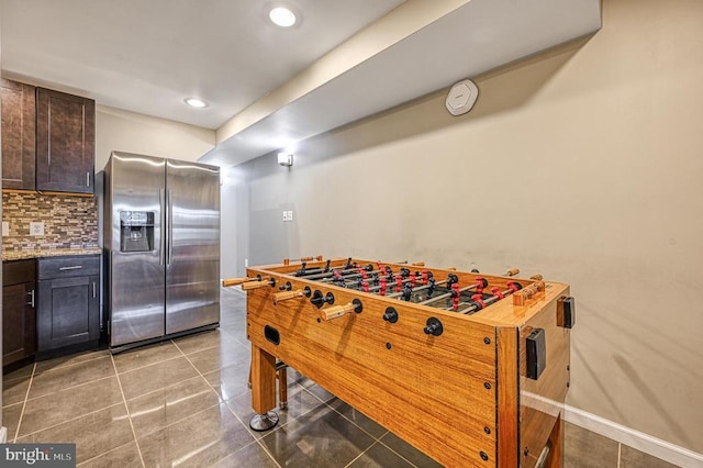 game room featuring light tile patterned flooring, baseboards, and recessed lighting