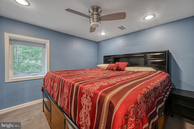 carpeted bedroom featuring baseboards, recessed lighting, and ceiling fan