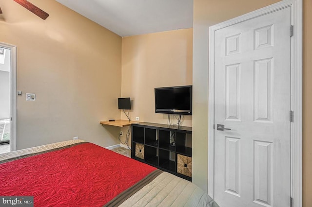 bedroom featuring baseboards