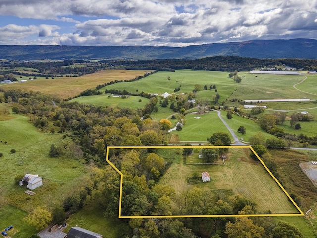 birds eye view of property featuring a rural view and a mountain view