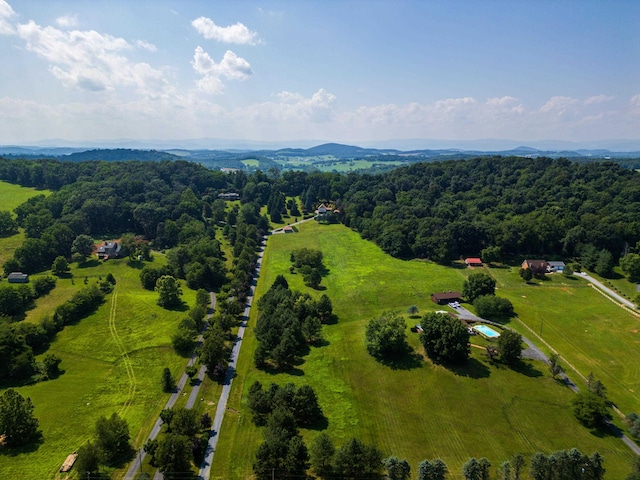 613 Dices Spring Rd, Weyers Cave, VA 24486 - aerial view of sparsely populated area with a heavily wooded area and a mountainous background
