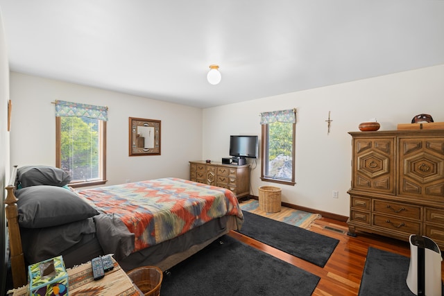 613 Dices Spring Rd, Weyers Cave, VA 24486 - bedroom with multiple windows and wood finished floors