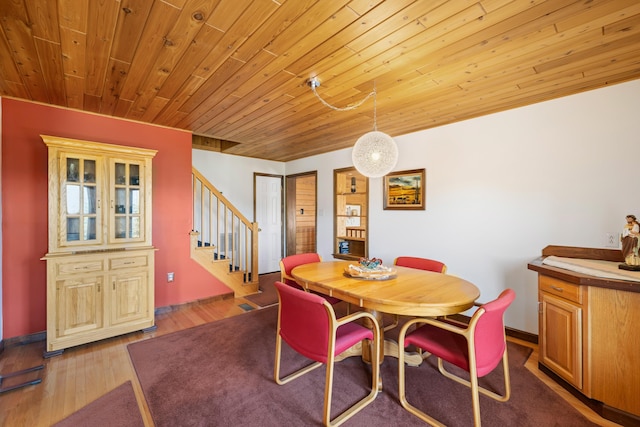 613 Dices Spring Rd, Weyers Cave, VA 24486 - dining space featuring stairway, wood finished floors, and wooden ceiling