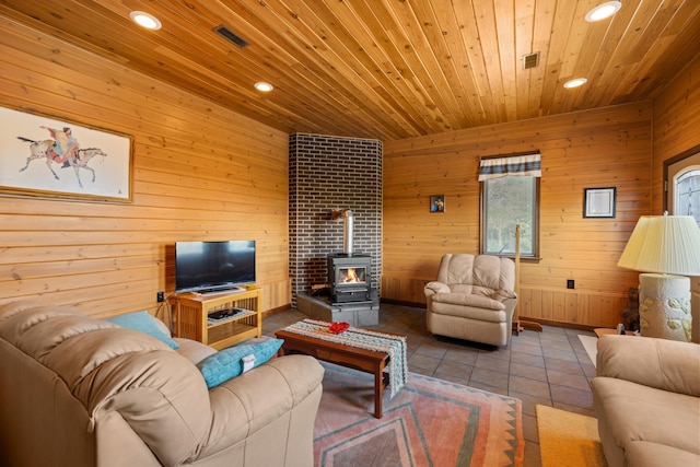613 Dices Spring Rd, Weyers Cave, VA 24486 - tiled living area featuring wood ceiling, a wood stove, recessed lighting, and wood walls