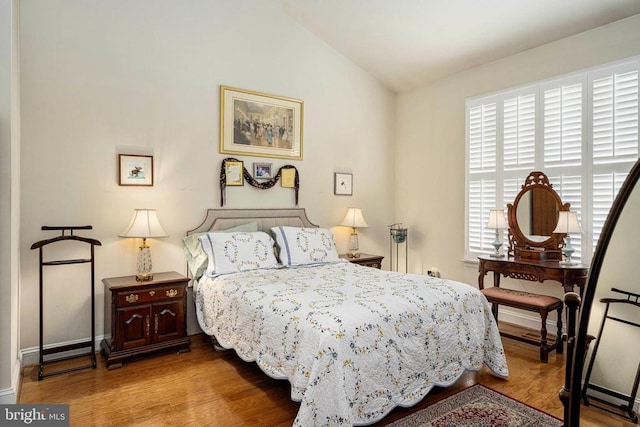 10207 Iverson Ave, Fredericksburg, VA 22407 - bedroom with vaulted ceiling, wood finished floors, and baseboards