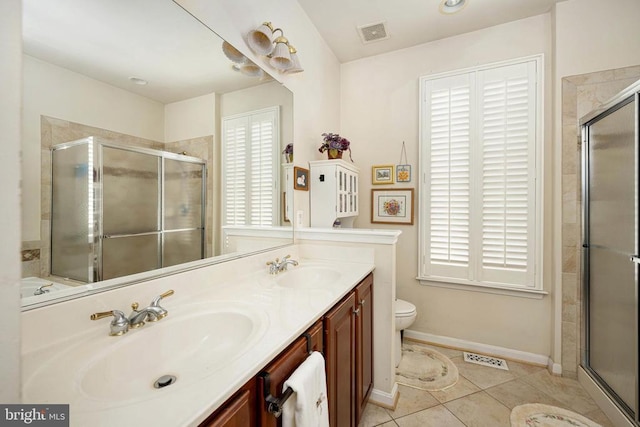 10207 Iverson Ave, Fredericksburg, VA 22407 - bathroom featuring double vanity, healthy amount of natural light, and a stall shower