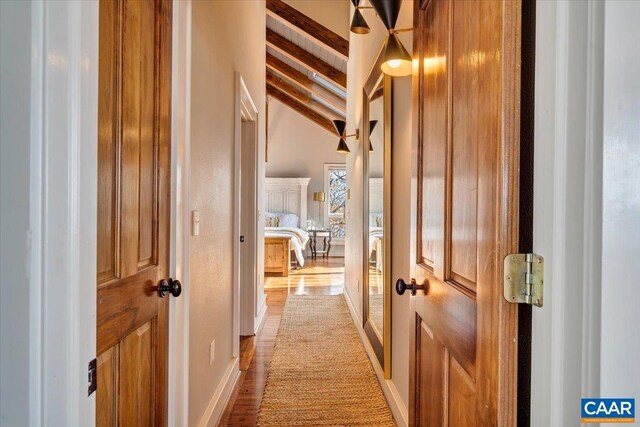 380 Blackrock Cir, Wintergreen Resort, VA 22967 - hallway featuring light wood-style flooring, baseboards, and vaulted ceiling with beams