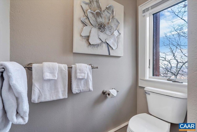 380 Blackrock Cir, Wintergreen Resort, VA 22967 - bathroom featuring healthy amount of natural light, toilet, and baseboards