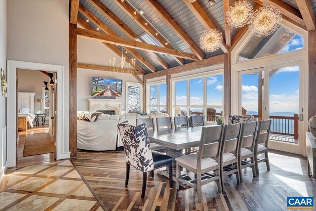 380 Blackrock Cir, Wintergreen Resort, VA 22967 - sunroom / solarium featuring a wealth of natural light, beam ceiling, and an inviting chandelier