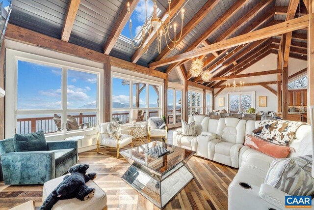 380 Blackrock Cir, Wintergreen Resort, VA 22967 - living area featuring an inviting chandelier, wood finished floors, high vaulted ceiling, and beam ceiling