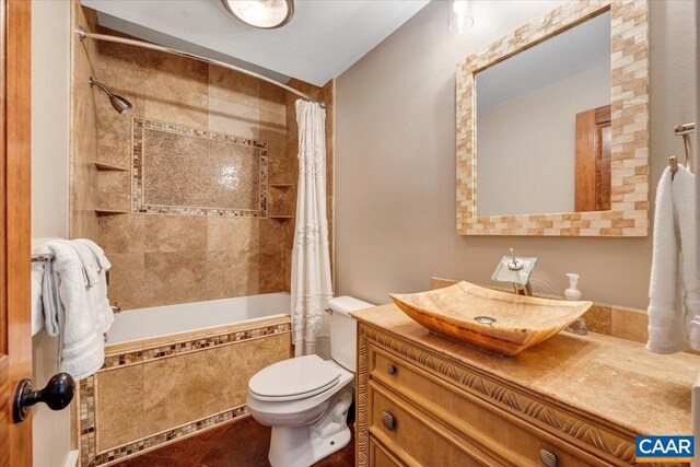 380 Blackrock Cir, Wintergreen Resort, VA 22967 - bathroom featuring tiled shower / bath combo, toilet, tile patterned floors, and vanity
