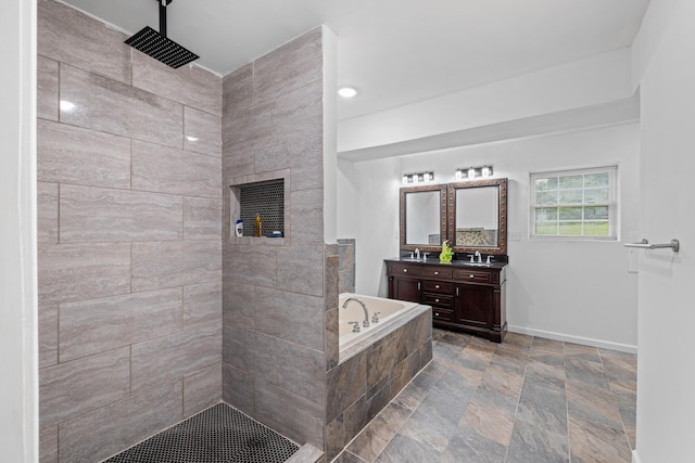 4220 Traveler Rd, Rockingham, VA 22801 - bathroom featuring vanity, a garden tub, walk in shower, stone finish floors, and baseboards