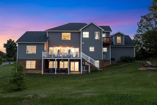 4220 Traveler Rd, Rockingham, VA 22801 - rear view of house with a patio area, stairs, a yard, a deck, and a balcony
