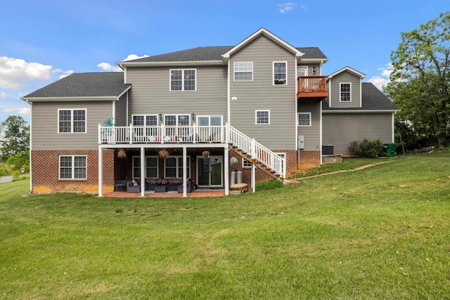 4220 Traveler Rd, Rockingham, VA 22801 - back of property with a patio area, a deck, a lawn, and brick siding