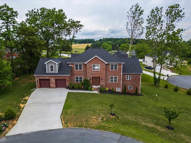 4220 Traveler Rd, Rockingham, VA 22801 - view of front of property featuring driveway, brick siding, a front lawn, and a shingled roof