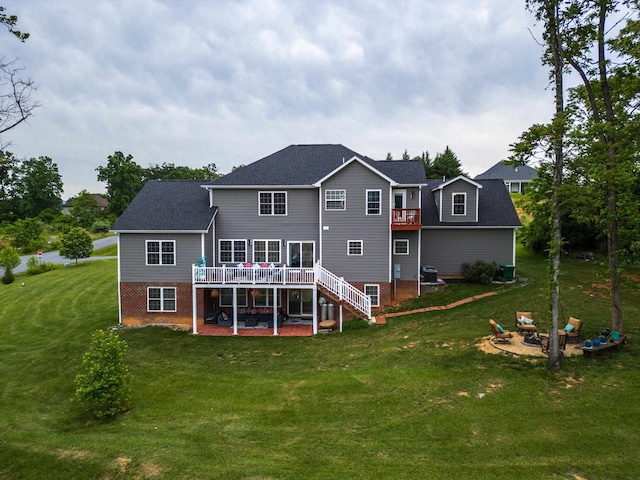 4220 Traveler Rd, Rockingham, VA 22801 - back of house featuring a patio area, a wooden deck, stairway, a lawn, and a shingled roof