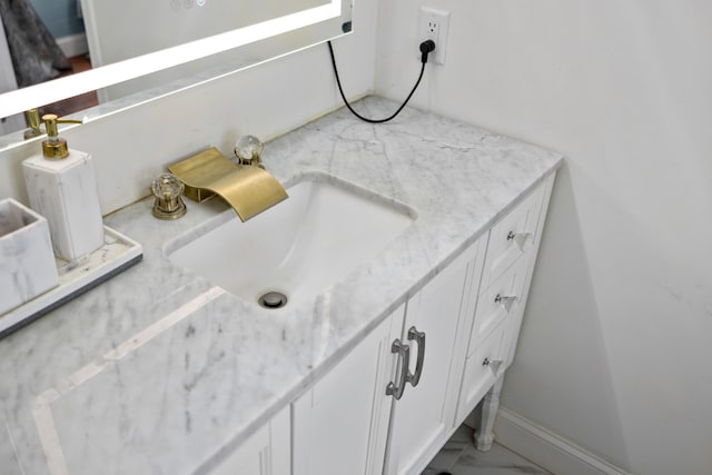 4220 Traveler Rd, Rockingham, VA 22801 - bathroom with vanity and marble look tile flooring