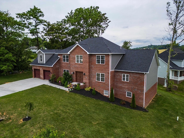 4220 Traveler Rd, Rockingham, VA 22801 - traditional-style home featuring brick siding, driveway, a front lawn, and roof with shingles