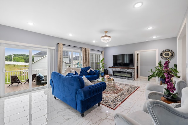 4220 Traveler Rd, Rockingham, VA 22801 - living area with light marble finish flooring, recessed lighting, and a glass covered fireplace