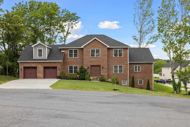 4220 Traveler Rd, Rockingham, VA 22801 - view of front facade featuring driveway, brick siding, a front yard, and roof with shingles