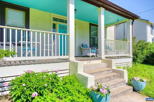 207 Douglas Ave, Charlottesville, VA 22902 - view of exterior entry with covered porch and stucco siding
