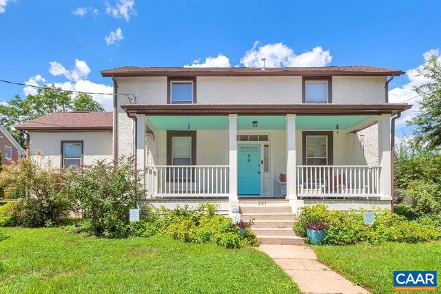 207 Douglas Ave, Charlottesville, VA 22902 - view of front of house with stucco siding, covered porch, and a front yard