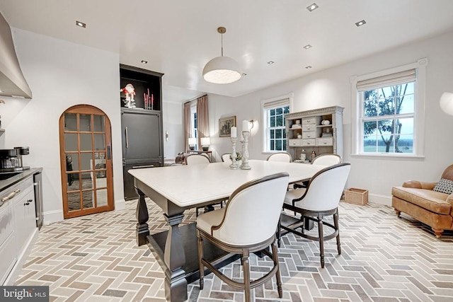  - dining room with brick floors